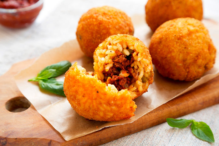 arancini. aussen gold. innen amore.